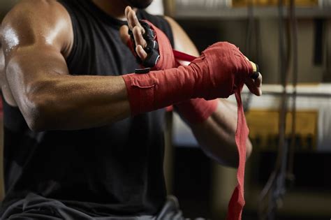 boxer with metal hands|wrapping hands for boxing.